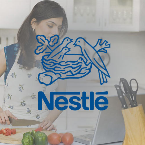 Nestle Logo with woman cooking